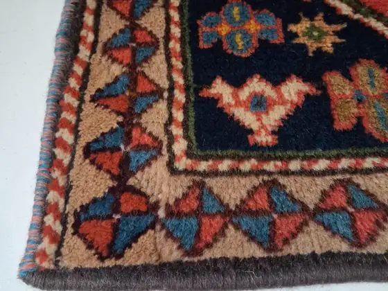 Tapis du Caucase, angle après reprise.